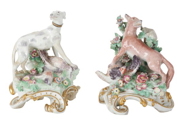 A PAIR OF DERBY TYPE PORCELAIN FIGURES OF THE FOX AND THE HOUND
