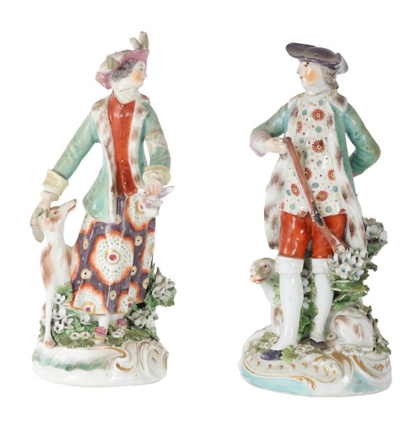 A PAIR OF DERBY PORCELAIN FIGURES OF A SPORTSMAN AND HIS COMPANION