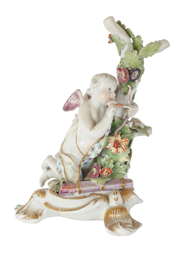 A DERBY TYPE PORCELAIN FIGURE OF CUPID