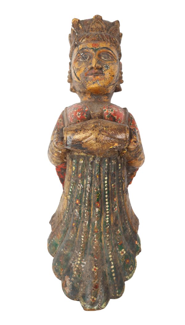 A SOUTH-EAST ASIAN PAINTED AND CARVED WOOD TEMPLE FIGURE