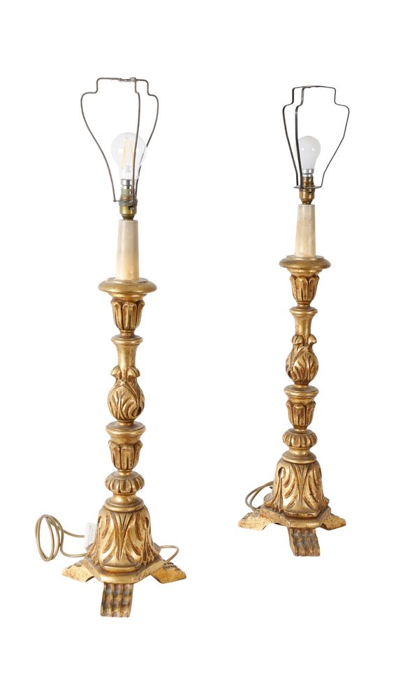 A PAIR OF CARVED AND GILTWOOD TABLE LAMPS