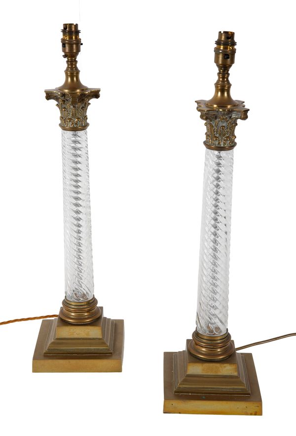 A PAIR OF BRASS MOUNTED TABLE LAMPS