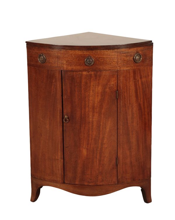 A REGENCY MAHOGANY BOWFRONT CORNER WASHSTAND