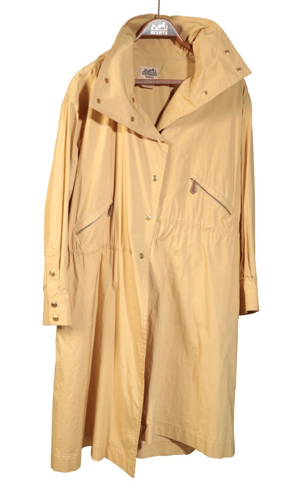 HERMES, PARIS: A LADIES POLYESTER AND NYLON VINTAGE RAIN COAT