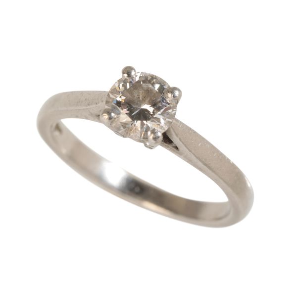 A DIAMOND SOLITAIRE RING WITH GIA REPORT