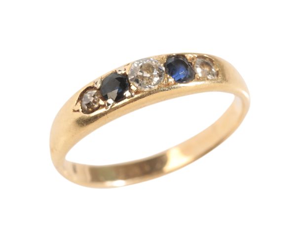 A SAPPHIRE AND DIAMOND GYPSY STYLE RING