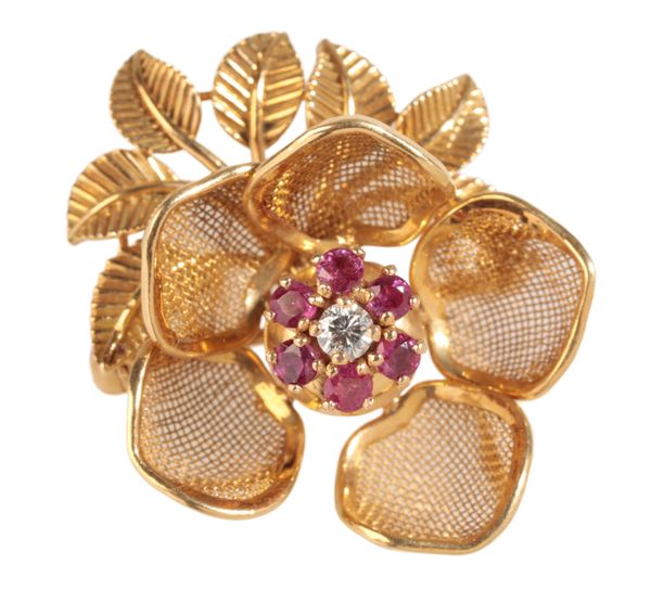 A RUBY AND DIAMOND CLUSTER BROOCH