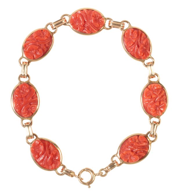 A CORAL AND GOLD BRACELET