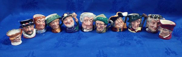 A COLLECTION OF MINATURE ROYAL DOULTON CHARACTER JUGS