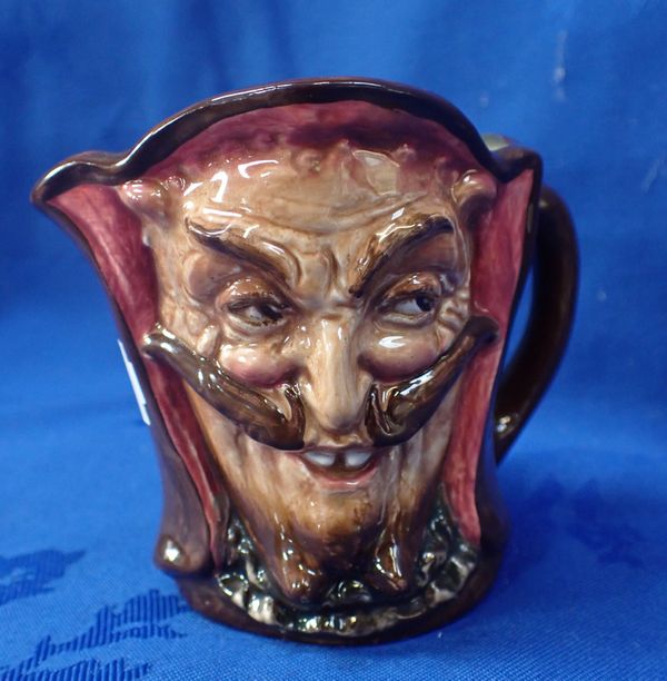 A ROYAL DOULTON 'MEPHISTOPHELES' JUG