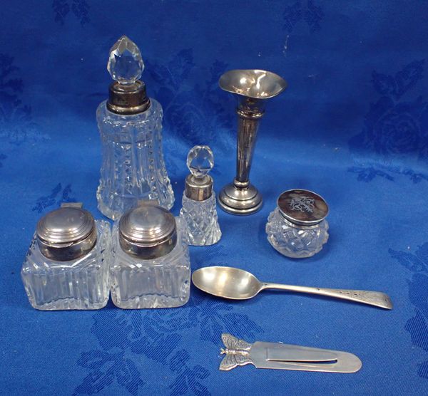 A PAIR OF SILVER TOPPED INKWELLS