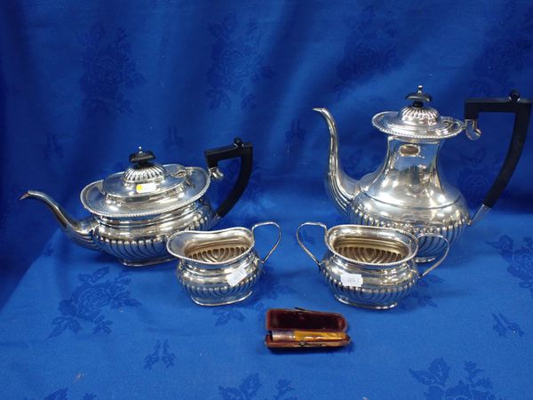 A SILVER-PLATED TEA SERVICE