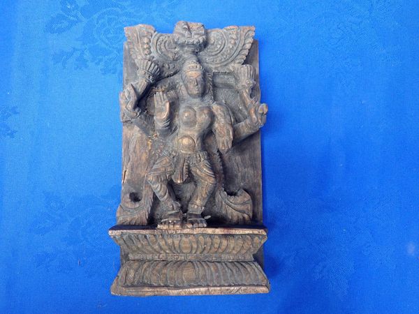 AN INDIAN CARVED WOOD LAKSHMI STATUE