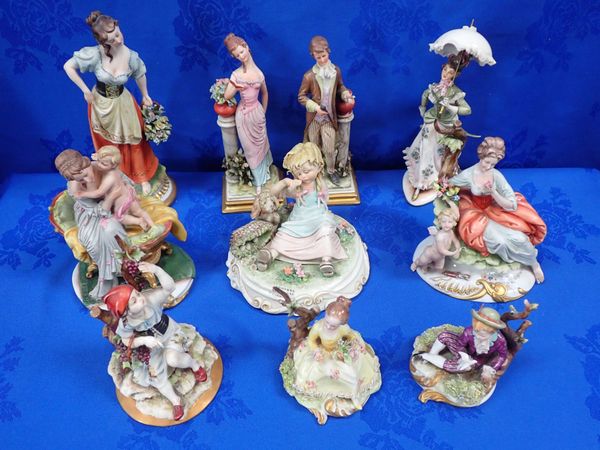 A COLLECTION OF CAPODIMONTE FIGURINES