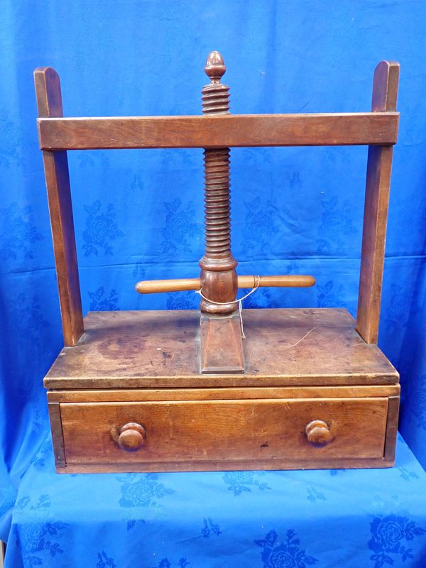 A 19TH CENTURY FRUITWOOD LINEN SCREW-PRESS