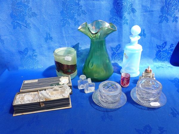 A PAIR OF CUT GLASS CONDIMENT POTS WITH STANDS