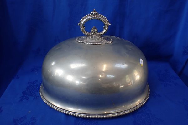 A LARGE SILVER-PLATED DISH COVER