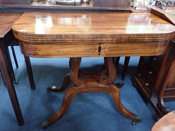 A REGENCY MAHOGANY TEA TABLE, ON LYRE-SHAPED SUPPORTS