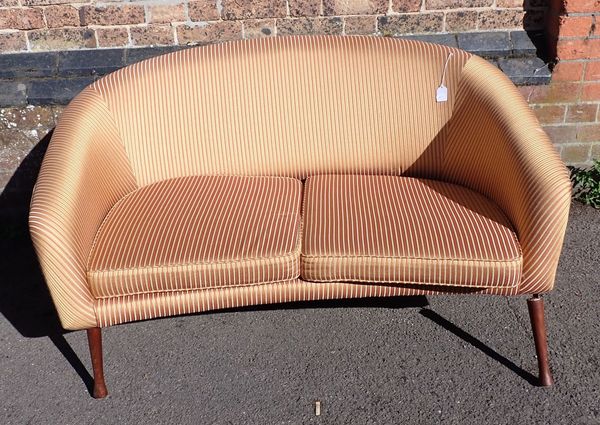 A 1960S STYLE  TWO-SEATER SOFA WITH ANGLED TEAK LEGS