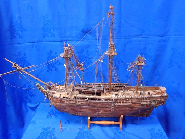 A SCRATCH-BUILT WOODEN MODEL OF H.M.S. 'BOUNTY'