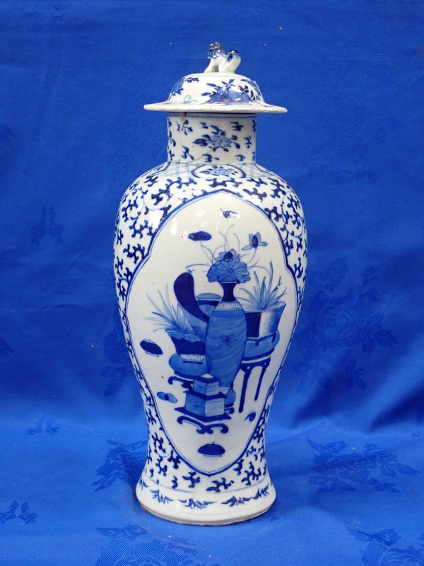 A CHINESE BLUE AND WHITE VASE AND COVER