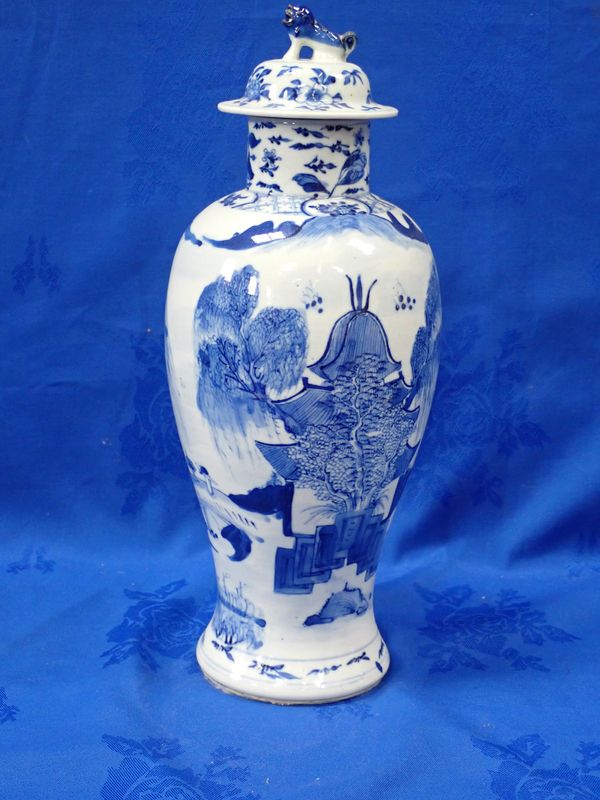 A CHINESE BLUE AND WHITE VASE AND COVER