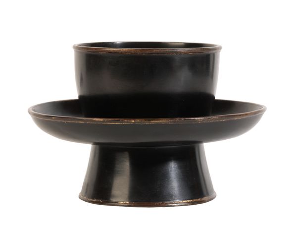 A BLACK LACQUER CUP-STAND,