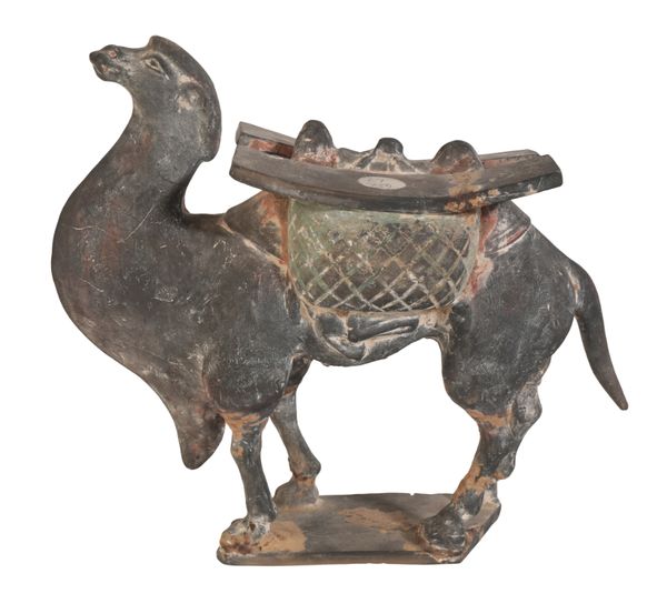 A CHINESE DARK GREY POTTERY FIGURE OF A LADEN CAMEL,