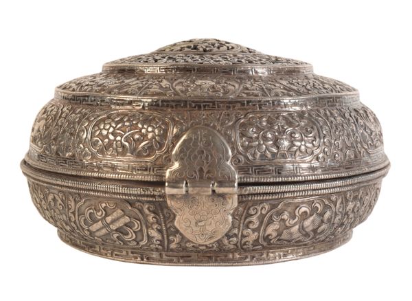 A FINE SINO TIBETAN REPOUSSE SILVER CIRCULAR INCENSE-BOX AND HINGED COVER
