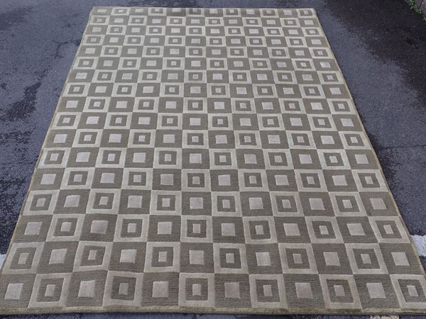 A MODERN RUG, WITH ALL OVER GEOMETRIC DESIGN