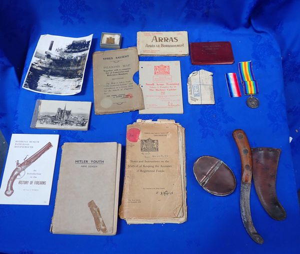 A COLLECTION OF FIRST AND SECOND WORLD WAR MEMORABILIA