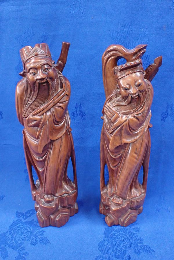 A PAIR OF 20TH CENTURY CHINESE WOOD FIGURES