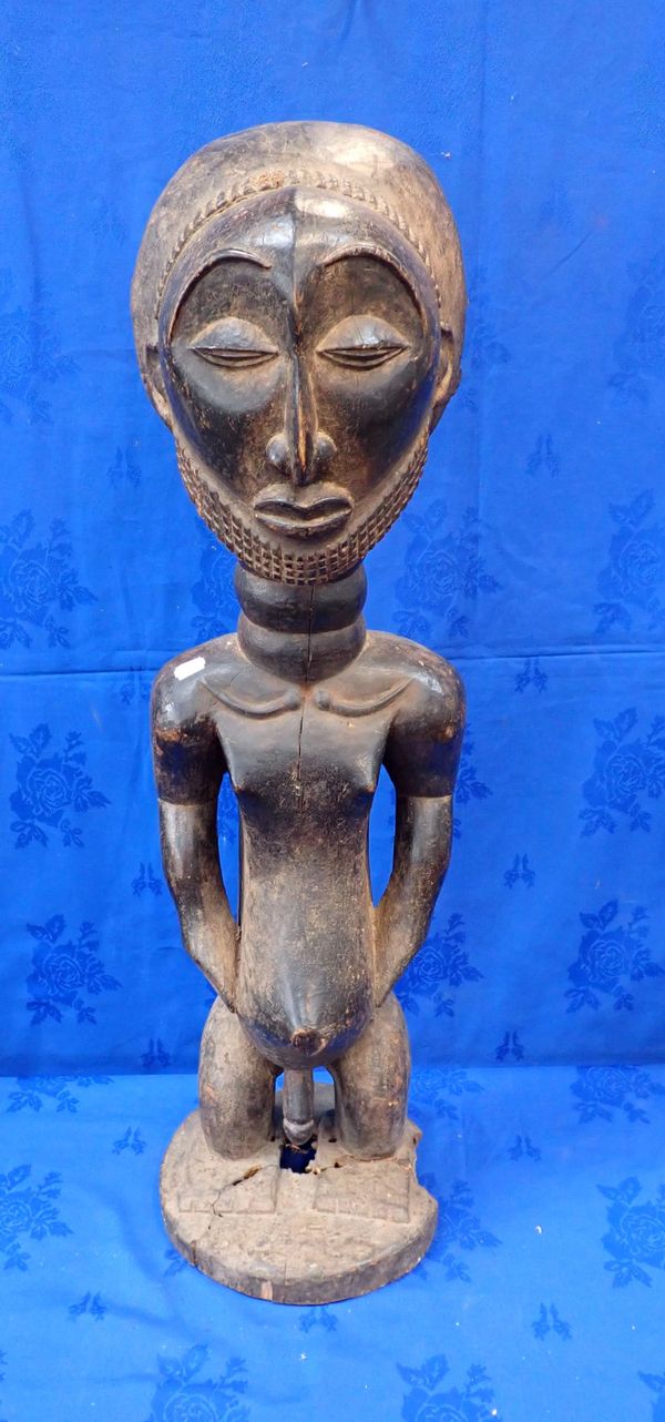 A LARGER AFRICAN TRIBAL STATUE