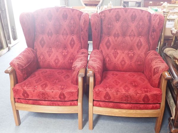 A PAIR OF ERCOL WING ARMCHAIRS