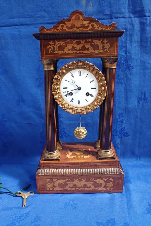 A 19TH CENTURY ROSEWOOD AND MARQUETRY PORTICO CLOCK