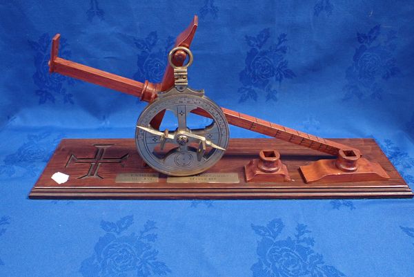 A REPRODUCTION BRASS ASTROLABE