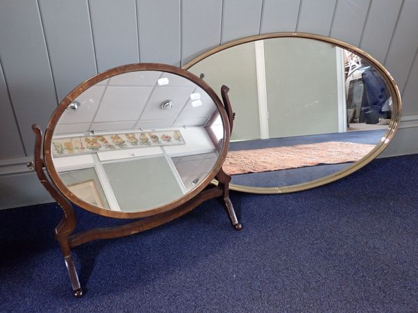 A GEORGE III STYLE DRESSING MIRROR WITH OVAL PLATE