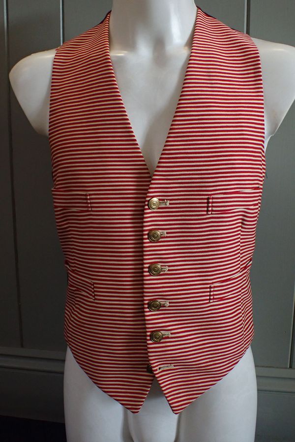 A RED AND CREAM STRIPED FOOTMAN'S LIVERY VEST OR WAISTCOAT