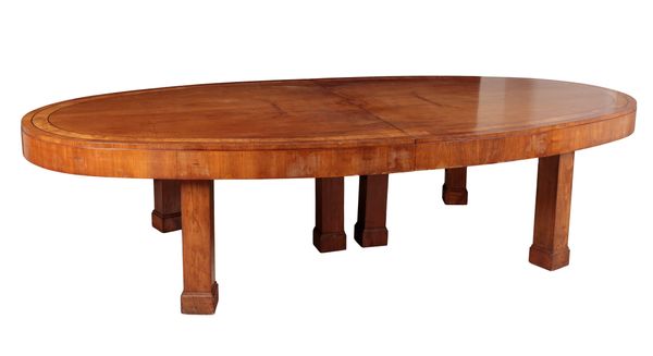 AN IMPRESSIVE WALNUT AND CROSSBANDED EXTENDING DINING TABLE