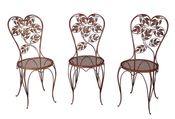 A SET OF SIX RED-PAINTED AND GILDED GARDEN CHAIRS