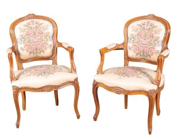 A PAIR OF LOUIS XV STYLE BEECH ARMCHAIRS