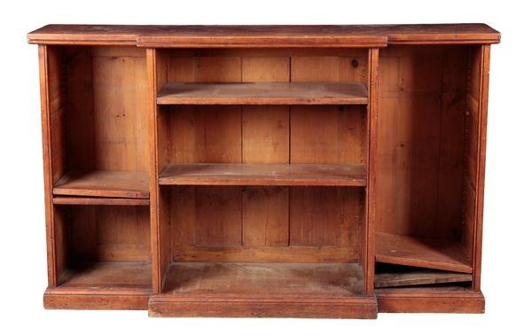 A STAINED PINE BREAKFRONT BOOKCASE