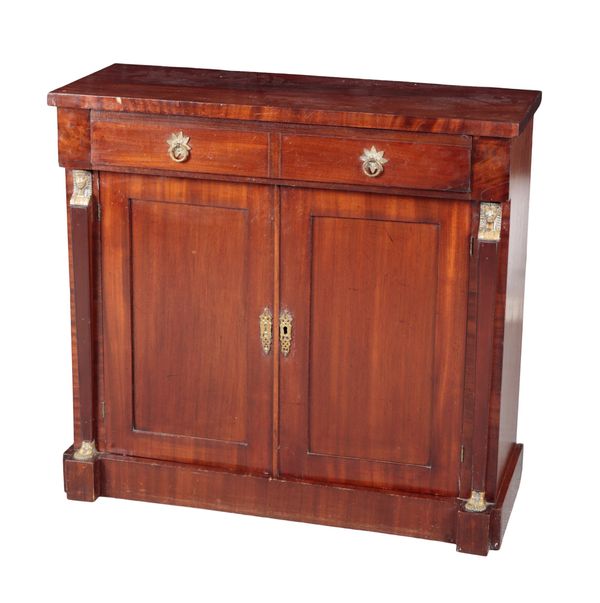 AN EMPIRE STYLE MAHOGANY AND GILT METAL MOUNTED SIDE CABINET