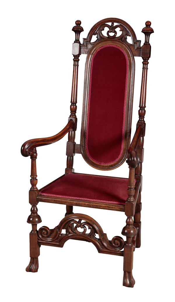 A WILLIAM AND MARY STYLE WALNUT ARMCHAIR