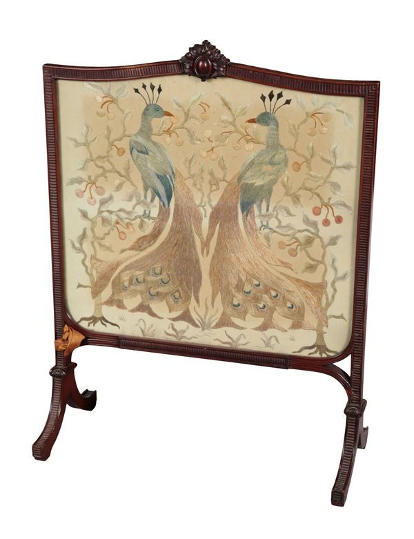 AN EDWARDIAN MAHOGANY FIRESCREEN