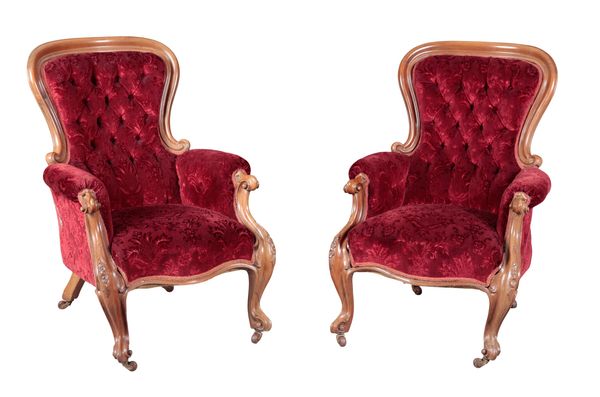 A PAIR OF VICTORIAN WALNUT SPOON BACK ARMCHAIRS