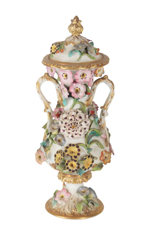 AN EARLY 19TH CENTURY ENGLISH FLORAL ENCRUSTED PORCELAIN TWO HANDLED VASE AND COVER