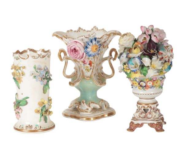 A 19TH CENTURY FLORAL ENCRUSTED PORCELAIN URN