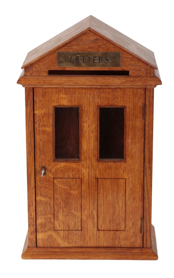 A MODERN OAK POST BOX