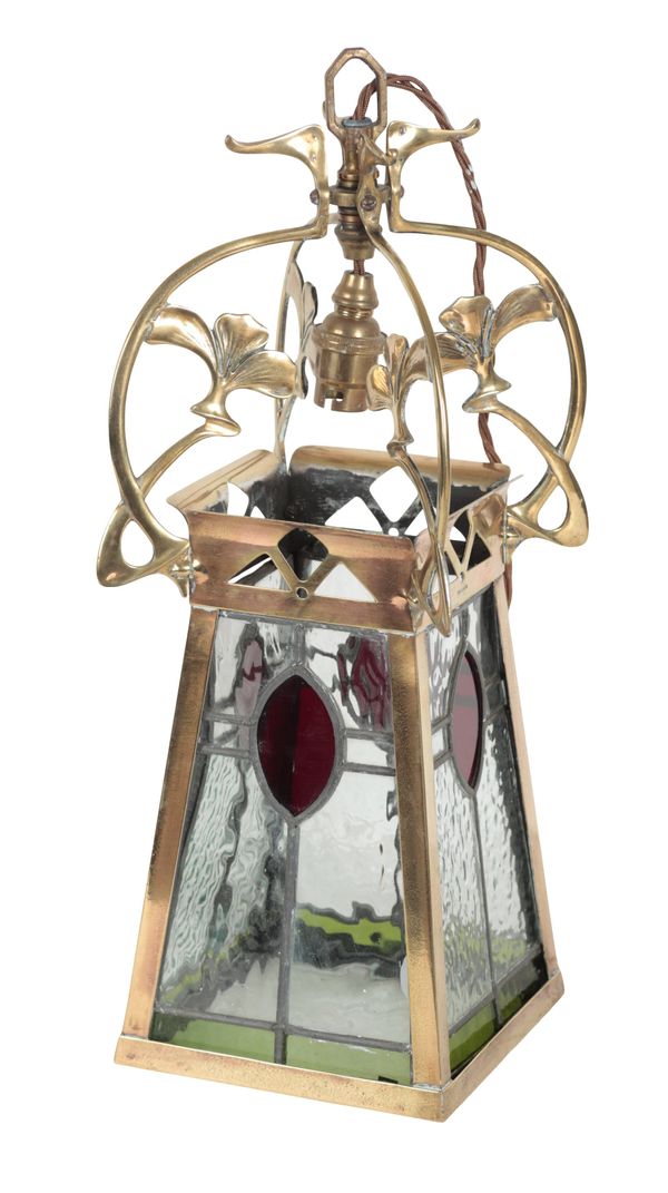 AN ART NOUVEAU BRASS AND STAINED GLASS HANGING LANTERN